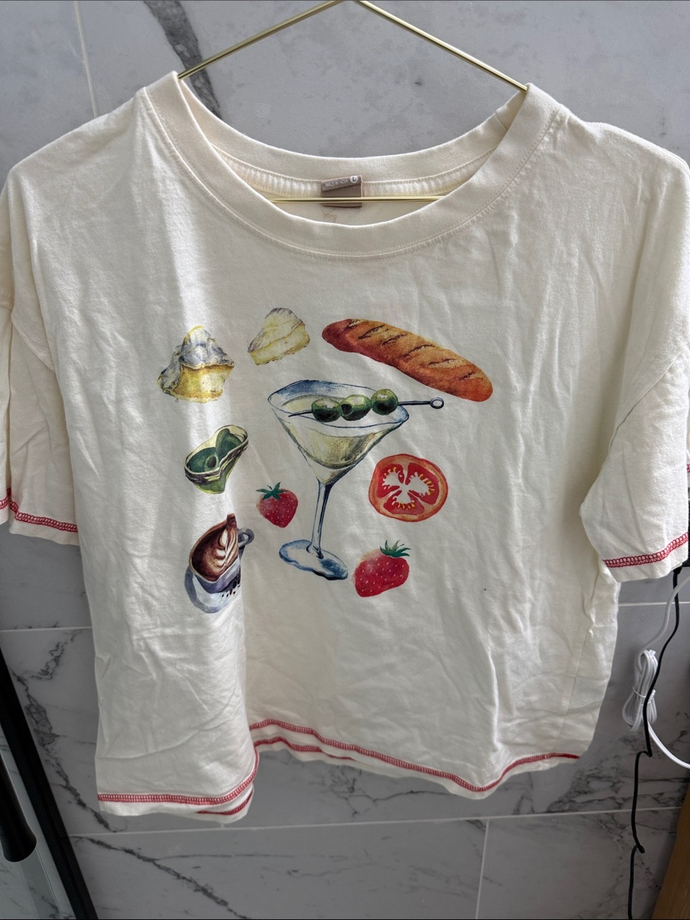 Messy Bun Cream Graphic Tee with martini motif